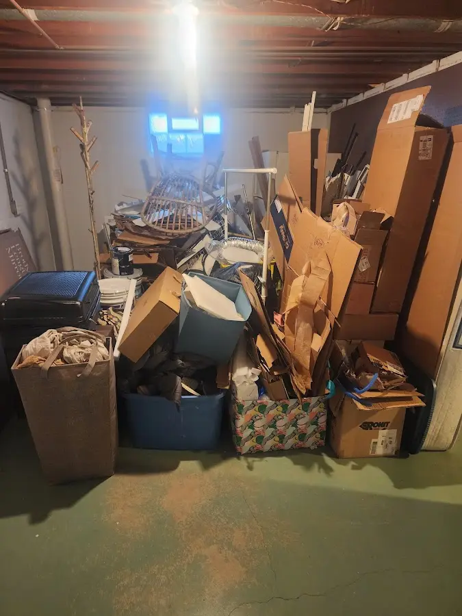 Roll-off dumpster container at job site for Construction Dumpster Rental in Foster